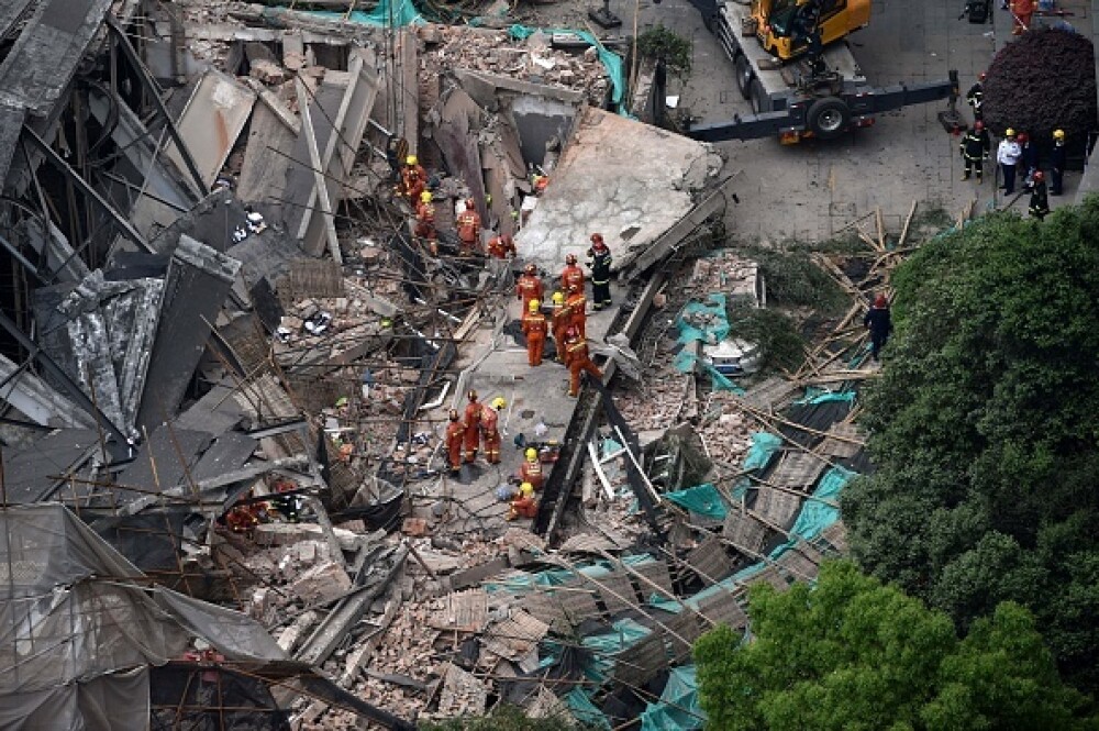 5 morți și 14 răniți, după ce o clădire s-a prăbușit la Shanghai. VIDEO, FOTO - Imaginea 2