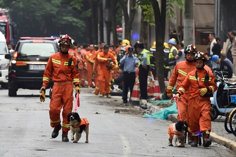 5 morți și 14 răniți, după ce o clădire s-a prăbușit la Shanghai. VIDEO, FOTO - Imaginea 9