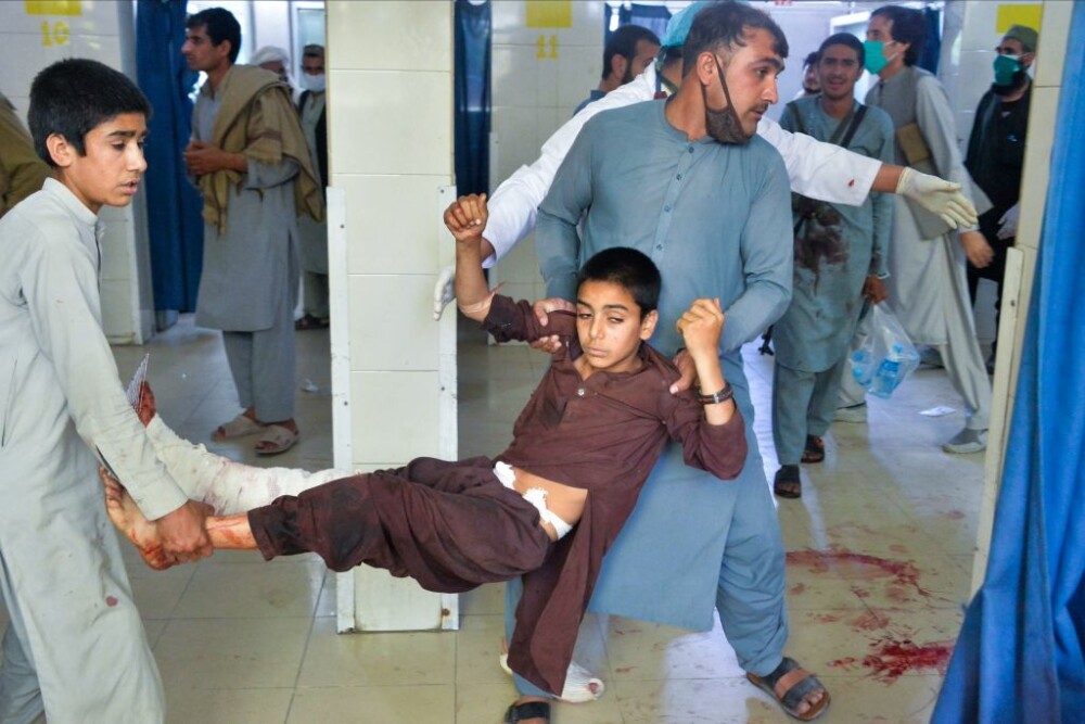 Zeci de morţi şi răniţi într-un atac sinucigaş în timpul unei ceremonii funerare în Afganistan - Imaginea 1