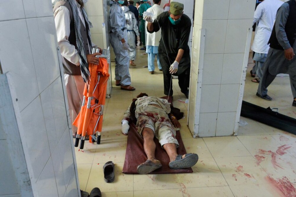 Zeci de morţi şi răniţi într-un atac sinucigaş în timpul unei ceremonii funerare în Afganistan - Imaginea 3
