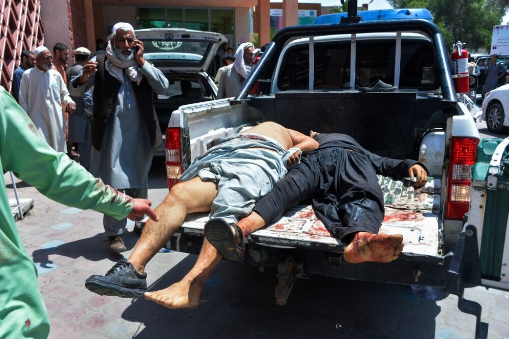 Zeci de morţi şi răniţi într-un atac sinucigaş în timpul unei ceremonii funerare în Afganistan - Imaginea 4