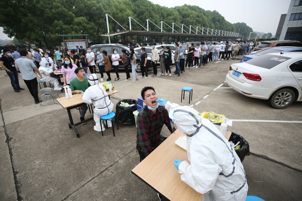 Acțiune de amploare în Wuhan. Peste 6 milioane de teste efectuate în rândul populației în doar 9 zile - Imaginea 1