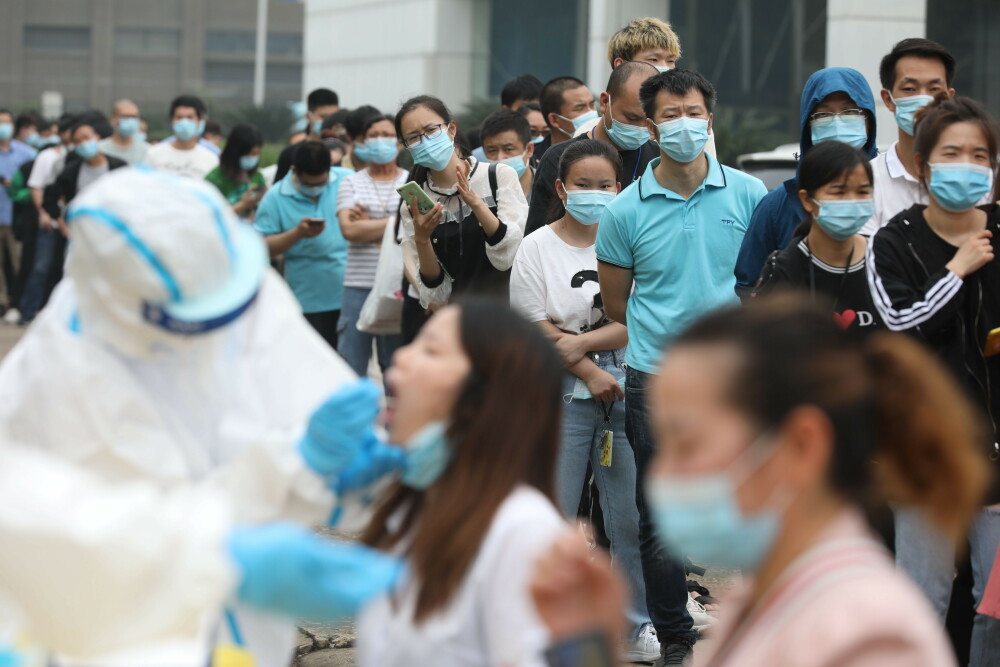 Acțiune de amploare în Wuhan. Peste 6 milioane de teste efectuate în rândul populației în doar 9 zile - Imaginea 6