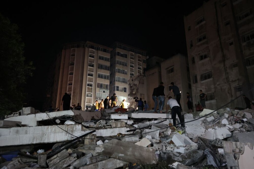 GALERIE FOTO. Imaginile dezastrului din Fâșia Gaza. Noi tiruri cu rachete duminică dimineață - Imaginea 6