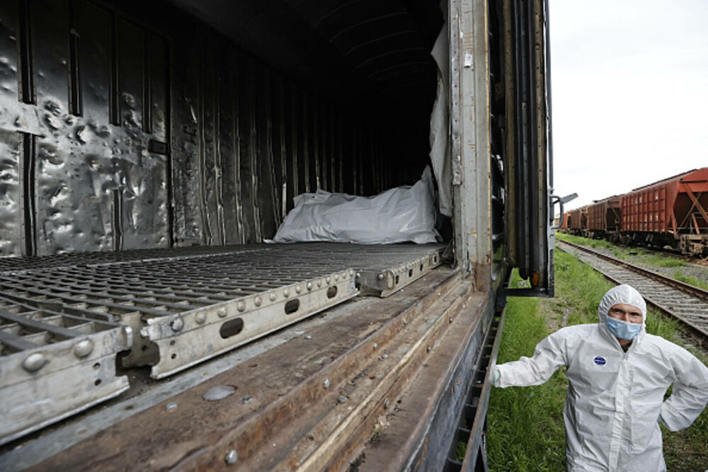 Tren frigorific plin cu cadavre ale soldaților ruși, abandonat în Ucraina de armata lui Putin. FOTO ȘI VIDEO - Imaginea 4