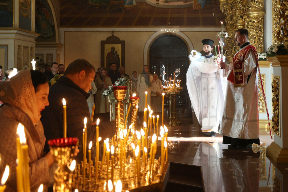 Al treilea Paşte în vreme de război. Ucrainienii au sărbătorit Învierea Domnului sub focuri de armă. FOTO - Imaginea 5