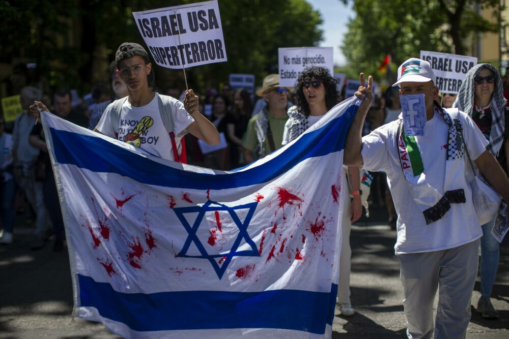 Proteste în Spania. 4.000 de persoane au manifestat la Madrid în sprijinul palestinienilor. GALERIE FOTO - Imaginea 10