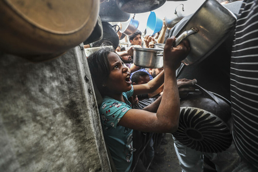 Copiii din Gaza, forțați să caute hrană în gunoaie. Ajutorul umanitar este blocat complet | GALERIE FOTO - Imaginea 7