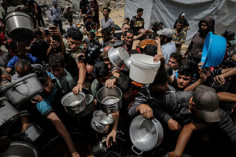 Copiii din Gaza, forțați să caute hrană în gunoaie. Ajutorul umanitar este blocat complet | GALERIE FOTO - Imaginea 8
