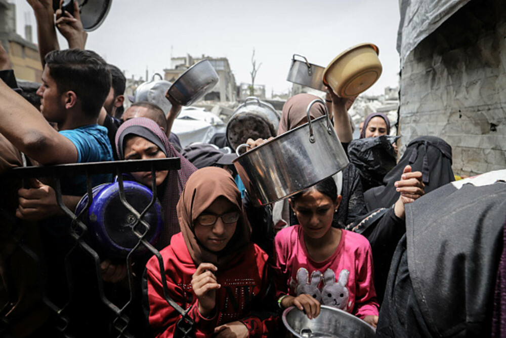 Copiii din Gaza, forțați să caute hrană în gunoaie. Ajutorul umanitar este blocat complet | GALERIE FOTO - Imaginea 11