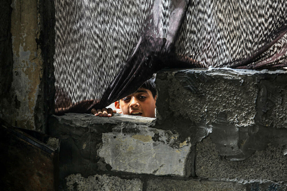 Copiii din Gaza, forțați să caute hrană în gunoaie. Ajutorul umanitar este blocat complet | GALERIE FOTO - Imaginea 12