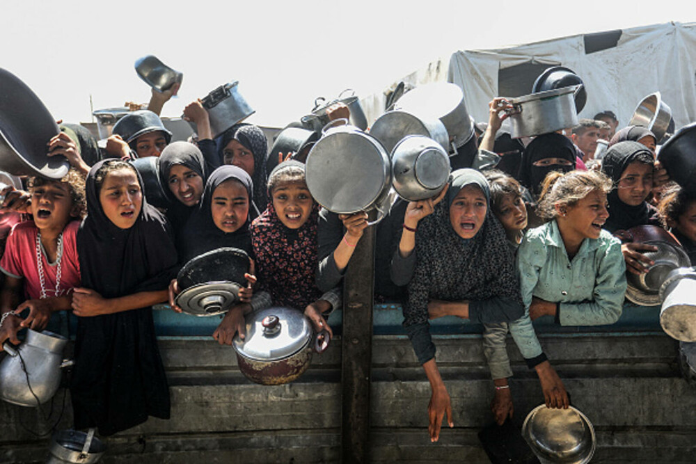 Copiii din Gaza, forțați să caute hrană în gunoaie. Ajutorul umanitar este blocat complet | GALERIE FOTO - Imaginea 18