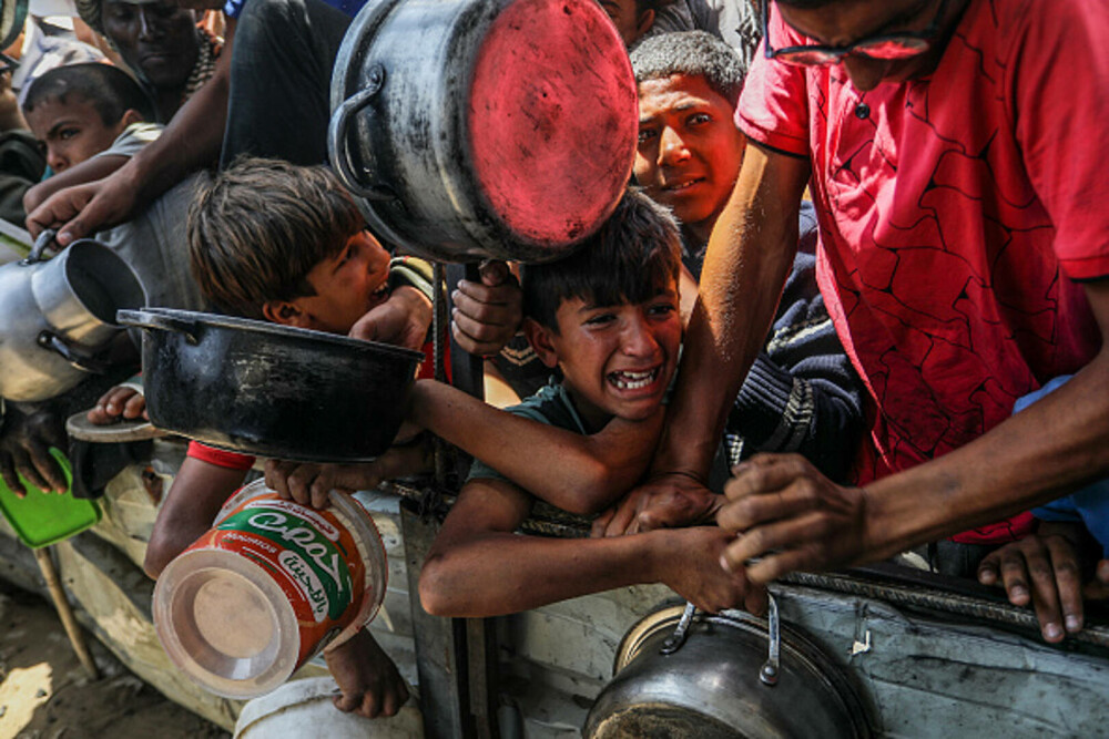 Copiii din Gaza, forțați să caute hrană în gunoaie. Ajutorul umanitar este blocat complet | GALERIE FOTO - Imaginea 20