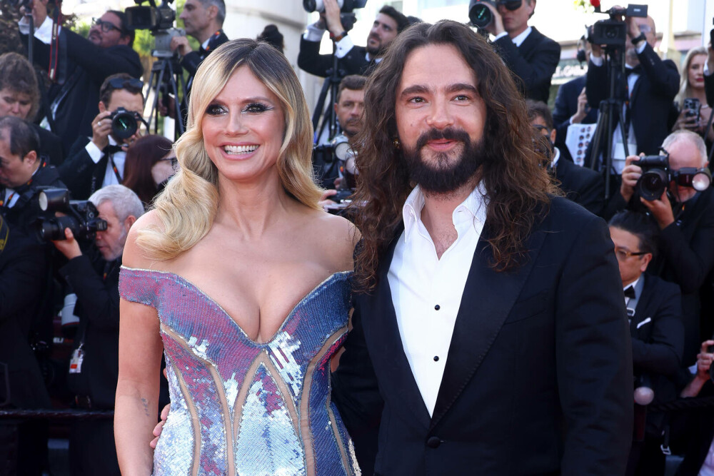 Heidi Klum a făcut furori pe covorul roșu la Cannes 2025, alături de soțul său. Ce ținută a purtat. GALERIE FOTO - Imaginea 5