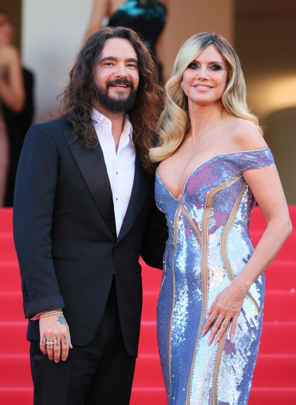 Heidi Klum a făcut furori pe covorul roșu la Cannes 2025, alături de soțul său. Ce ținută a purtat. GALERIE FOTO - Imaginea 11