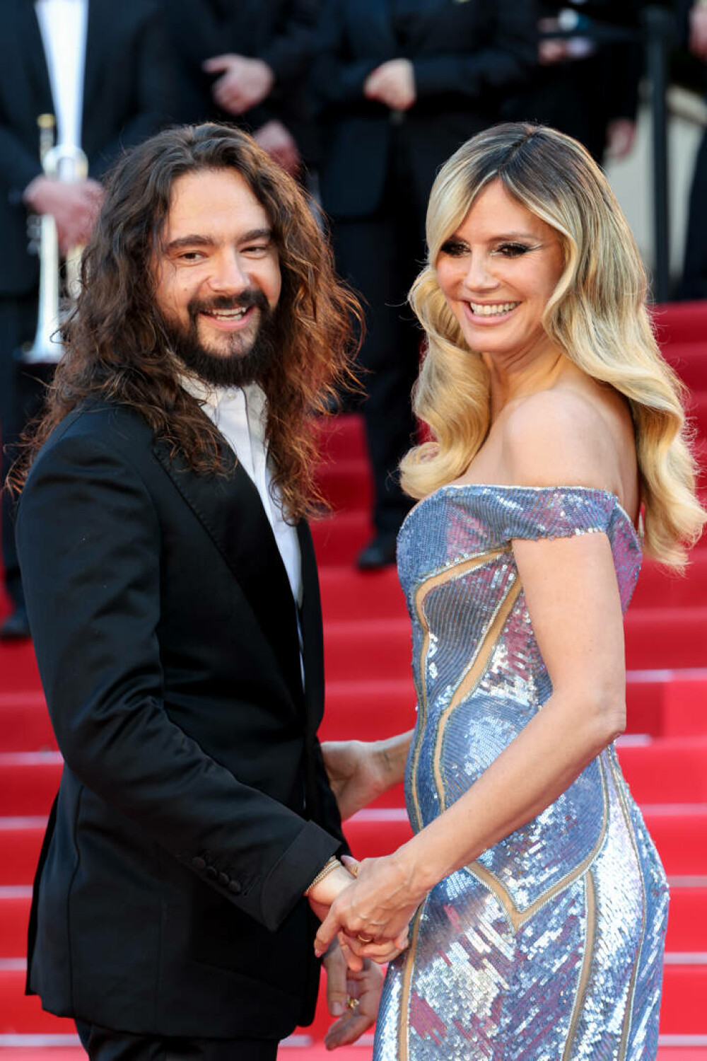 Heidi Klum a făcut furori pe covorul roșu la Cannes 2025, alături de soțul său. Ce ținută a purtat. GALERIE FOTO - Imaginea 22