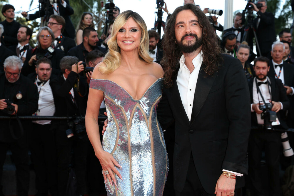 Heidi Klum a făcut furori pe covorul roșu la Cannes 2025, alături de soțul său. Ce ținută a purtat. GALERIE FOTO - Imaginea 34