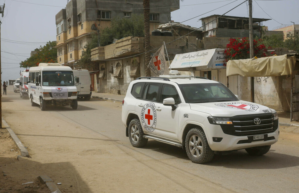 Un grup umanitar susținut de SUA distribuie ajutoare în Gaza, în timp ce raidurile aeriene continuă. FOTO - Imaginea 13