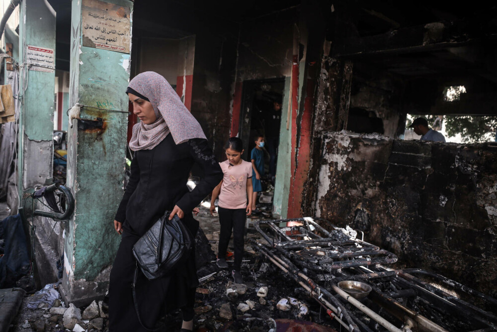 Un grup umanitar susținut de SUA distribuie ajutoare în Gaza, în timp ce raidurile aeriene continuă. FOTO - Imaginea 15