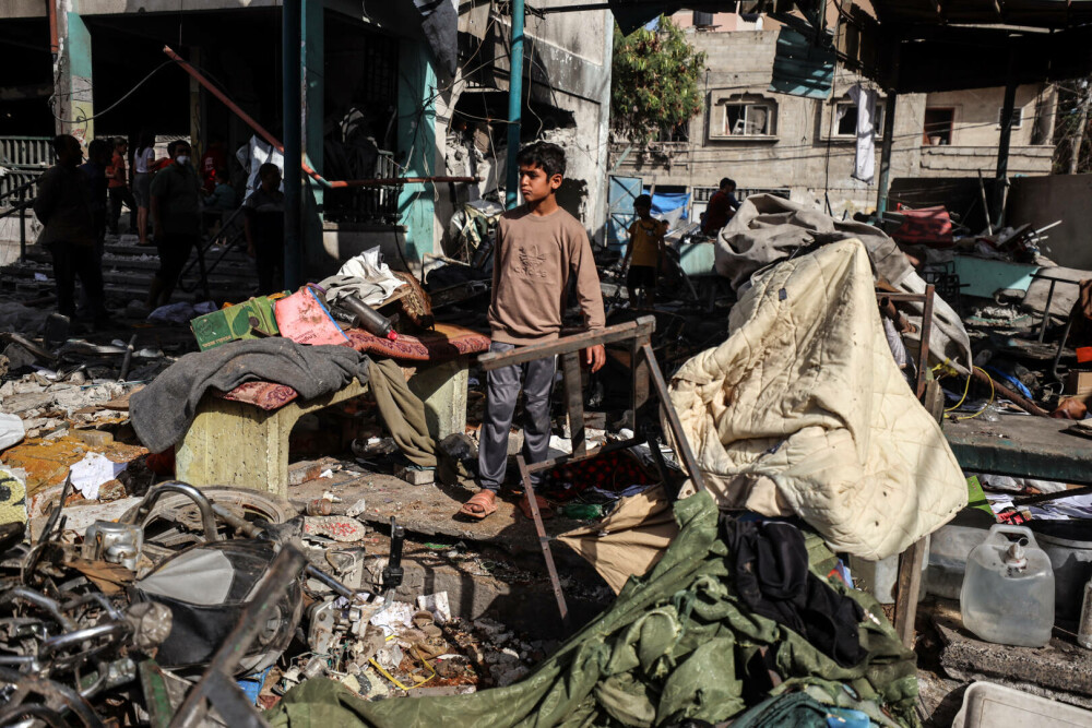 Un grup umanitar susținut de SUA distribuie ajutoare în Gaza, în timp ce raidurile aeriene continuă. FOTO - Imaginea 20