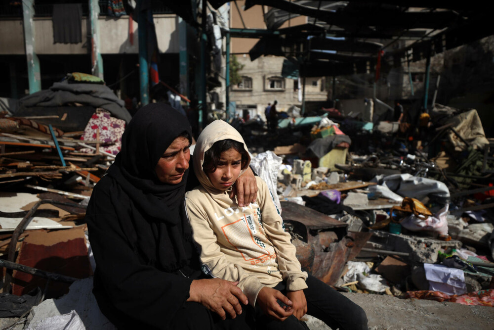 Un grup umanitar susținut de SUA distribuie ajutoare în Gaza, în timp ce raidurile aeriene continuă. FOTO - Imaginea 22