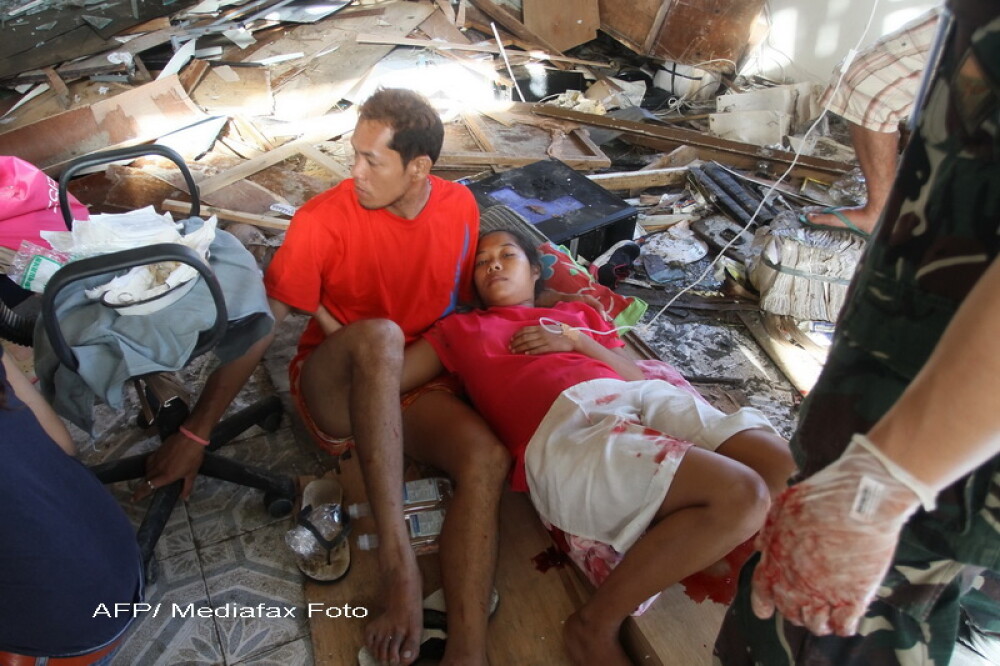 Speranta dupa dezastrul din Filipine. O femeie a nascut printre daramaturi, dupa trecerea taifunului - Imaginea 1