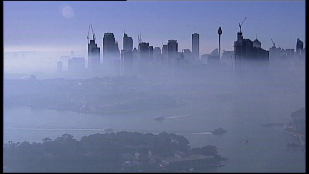 Imagini apocaliptice în Sydney. Orașul, acoperit de fum după incendiile recente - Imaginea 2