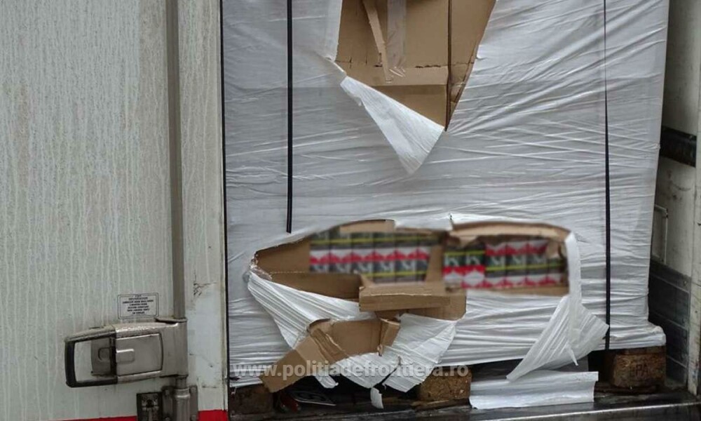 Ţigări de contrabandă de peste 1.400.000 de euro, descoperite de poliţişti într-o remorcă frigorifică, în Dolj - Imaginea 1