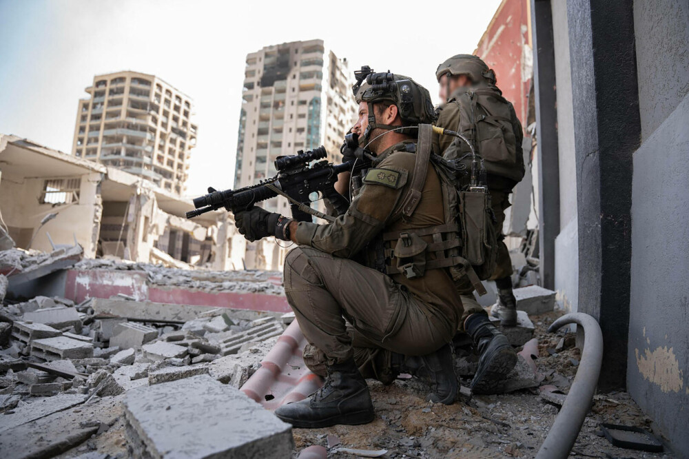 Israelul a anunțat că a ”finalizat destructurarea grupării Hamas din nordul Fâșiei Gaza”. 176 de soldați israelieni au murit - Imaginea 7
