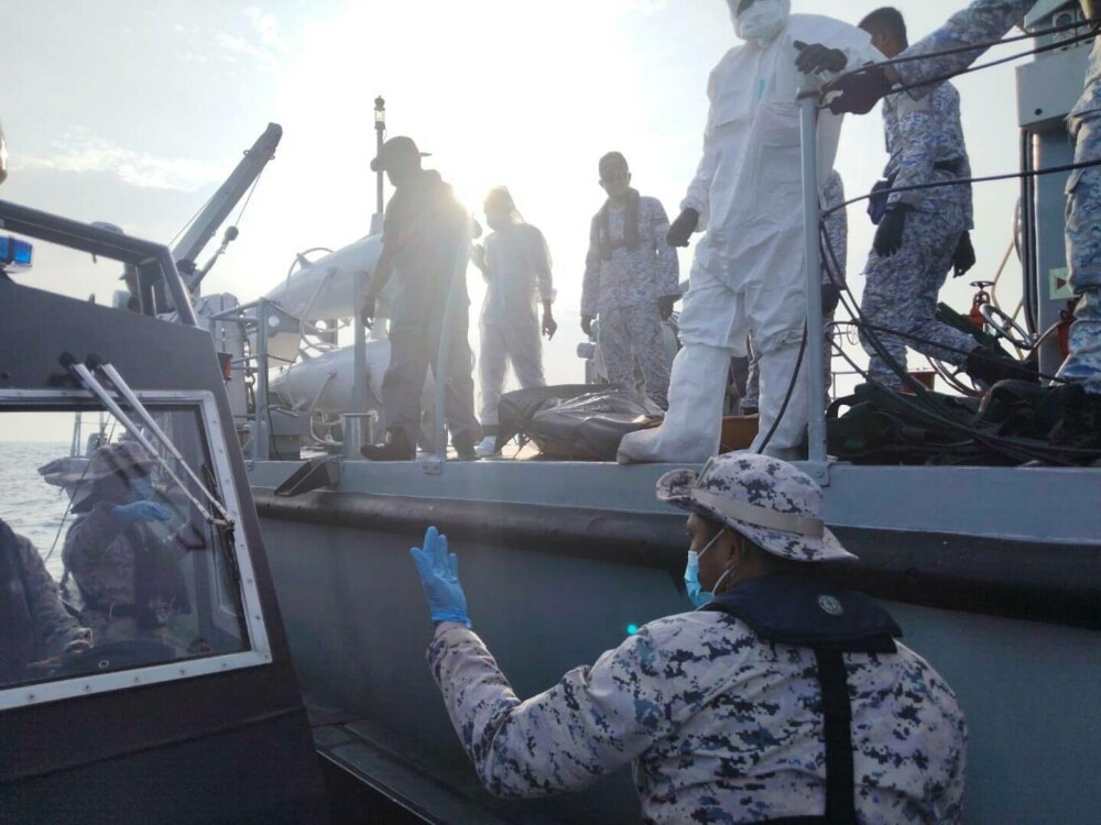 Cel puţin 21 de morţi după naufragiul unei ambarcaţiuni cu migranţi rohingya în apropiere de Malaezia şi Thailanda. FOTO - Imaginea 1