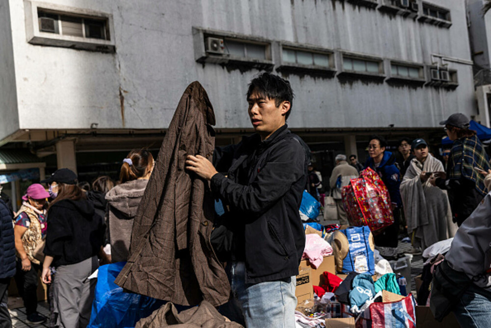 Nou bilanț al incendiului din Hong Kong: 151 de morți și 14 arestări. Unele cadavre ar putea să nu fie găsite niciodată - Imaginea 19