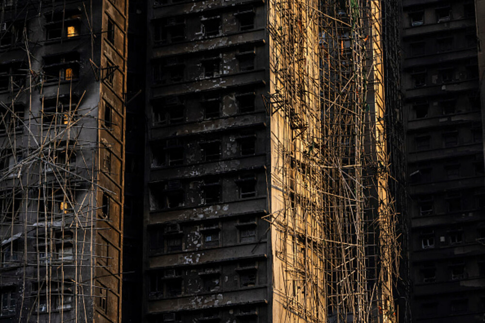 Nou bilanț al incendiului din Hong Kong: 151 de morți și 14 arestări. Unele cadavre ar putea să nu fie găsite niciodată - Imaginea 18