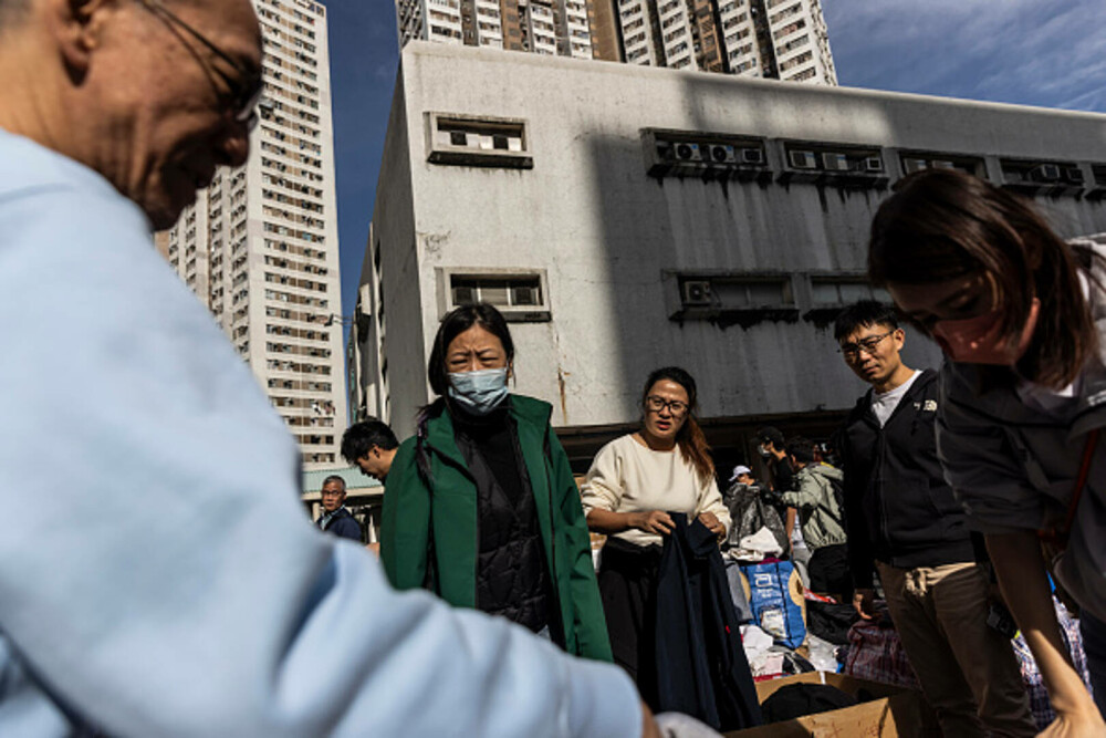 128 de oameni au murit în incendiul care a distrus blocurile turn din Hong Kong. „Este un dezastru”. GALERIE FOTO & VIDEO - Imaginea 41