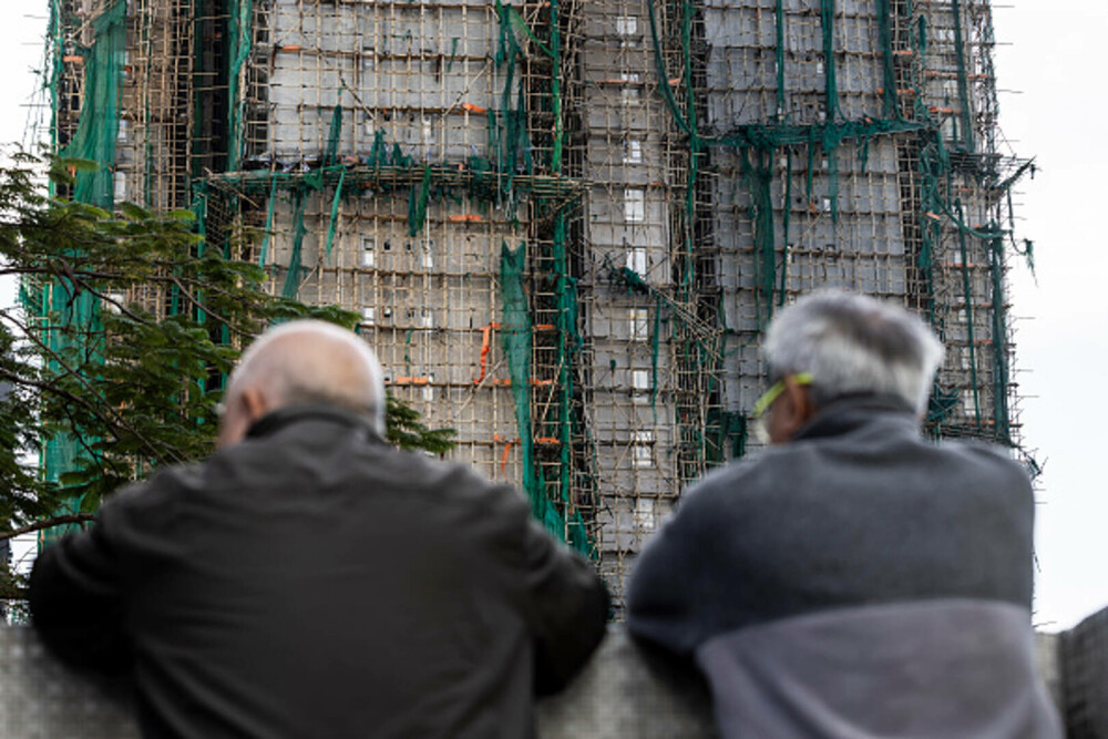 128 de oameni au murit în incendiul care a distrus blocurile turn din Hong Kong. „Este un dezastru”. GALERIE FOTO & VIDEO - Imaginea 42