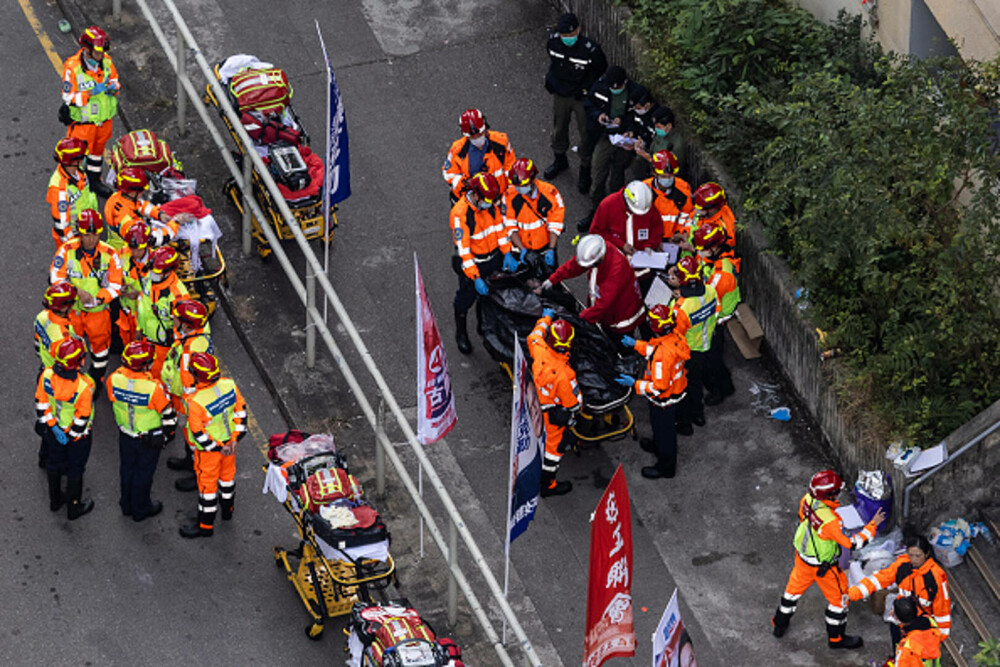 Nou bilanț al incendiului din Hong Kong: 151 de morți și 14 arestări. Unele cadavre ar putea să nu fie găsite niciodată - Imaginea 16