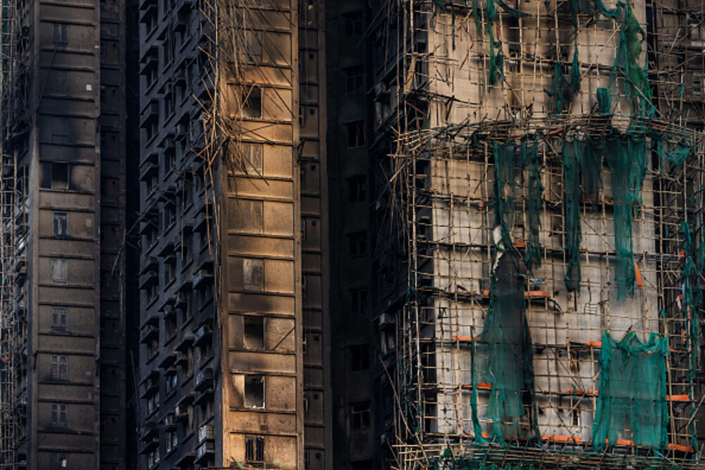 Nou bilanț al incendiului din Hong Kong: 151 de morți și 14 arestări. Unele cadavre ar putea să nu fie găsite niciodată - Imaginea 15