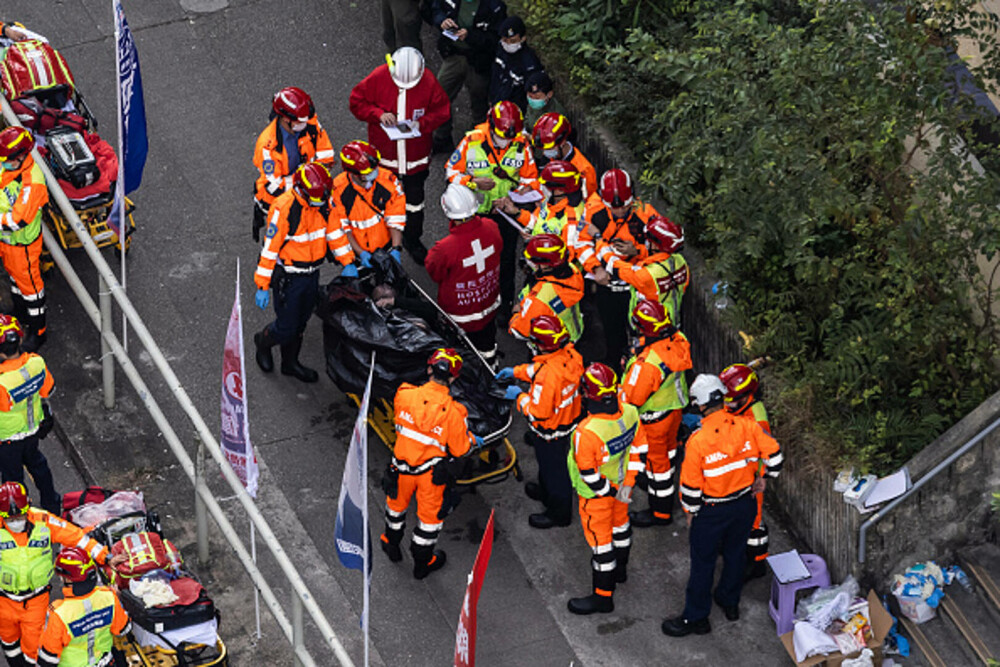 Nou bilanț al incendiului din Hong Kong: 151 de morți și 14 arestări. Unele cadavre ar putea să nu fie găsite niciodată - Imaginea 14