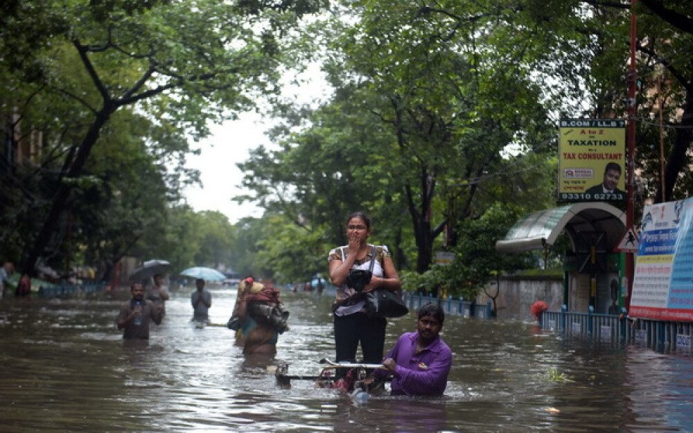 Inundatii devastatoare in India. Cel putin 48 de oameni au murit. GALERIE FOTO - Imaginea 1