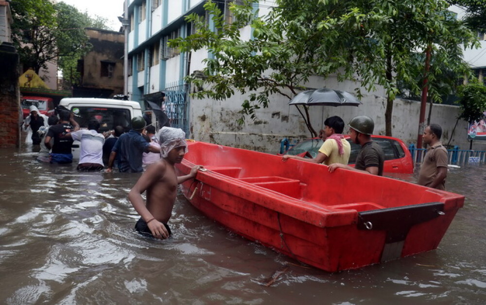 Inundatii devastatoare in India. Cel putin 48 de oameni au murit. GALERIE FOTO - Imaginea 4