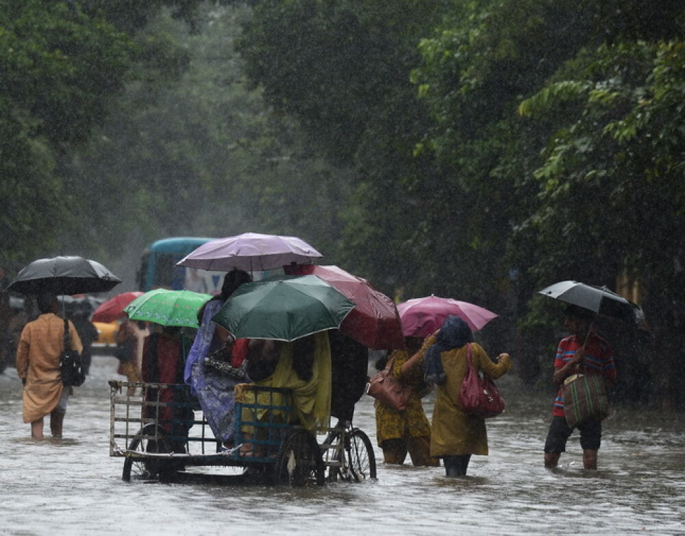 Inundatii devastatoare in India. Cel putin 48 de oameni au murit. GALERIE FOTO - Imaginea 6