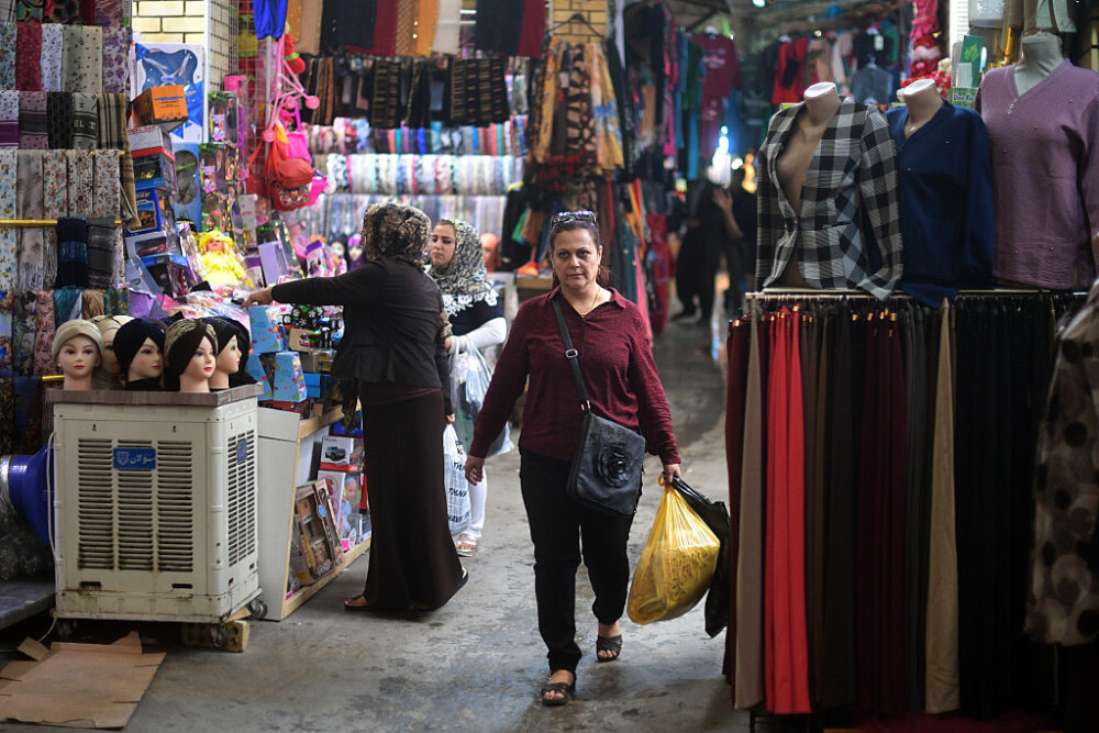 Viața după ISIS. Comercianții din Mosul își redeschid afacerile interzise de jihadiști - Imaginea 1
