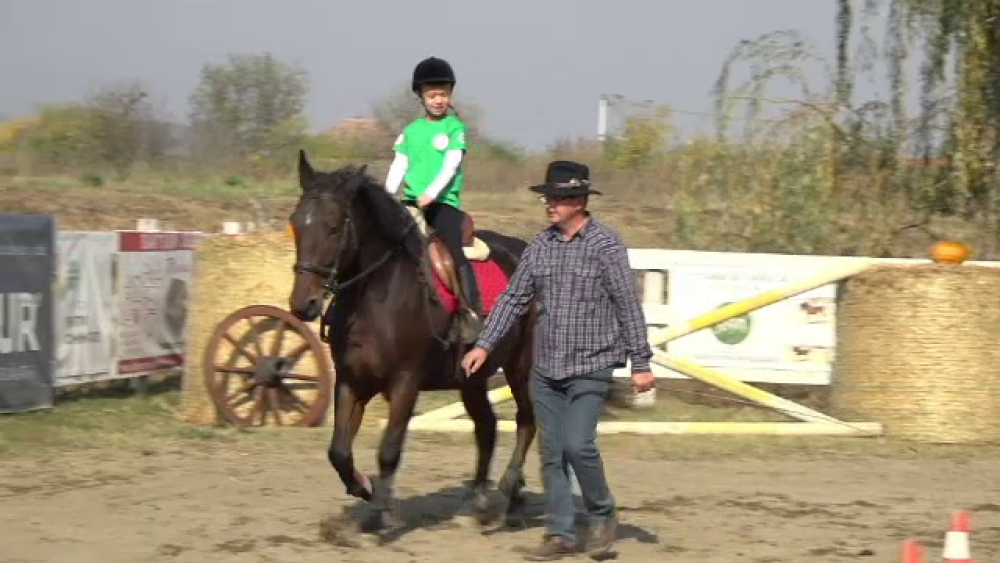 Terapie prin echitație. Mai multe familii au luat parte la un concurs de călărit - Imaginea 7