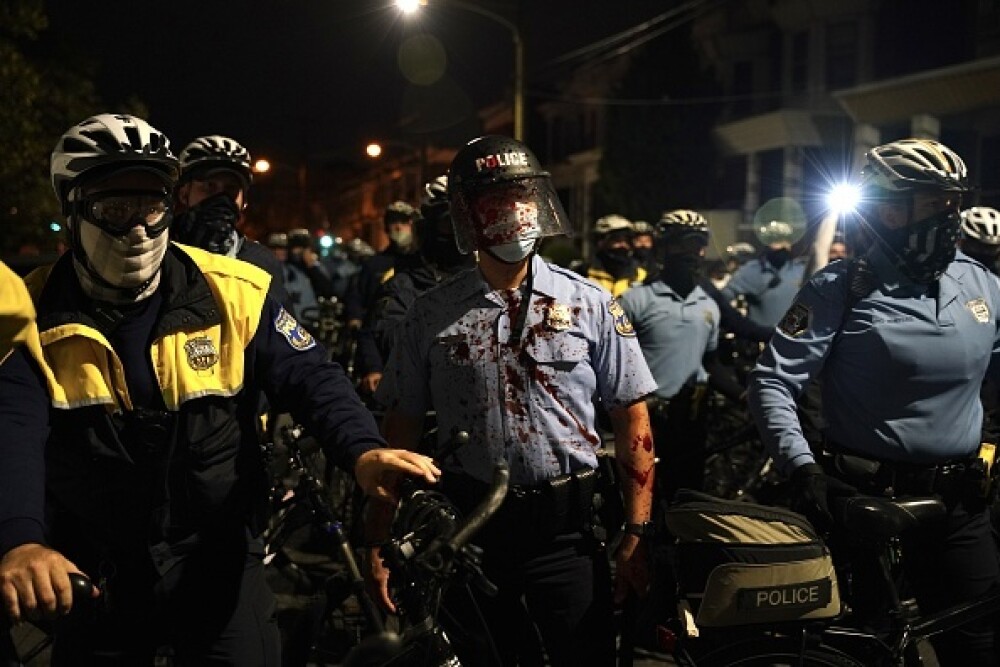 Ciocniri violente în Philadelphia, după ce un afro-american a fost împușcat mortal de poliție. GALERIE FOTO - Imaginea 10