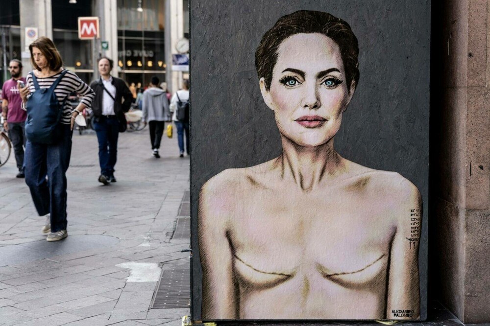 Cum a apărut Angelina Jolie pe un zid din Milano. Imaginea simbolizează un avertisment pentru femeile din întreaga lume. FOTO - Imaginea 3