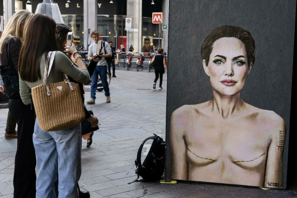 Cum a apărut Angelina Jolie pe un zid din Milano. Imaginea simbolizează un avertisment pentru femeile din întreaga lume. FOTO - Imaginea 9