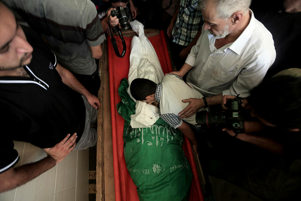 Răpiți, masacrați și îngropați. Ororile inimaginabile prin care trec victimele nevinovate din Israel și Gaza | FOTO - Imaginea 1