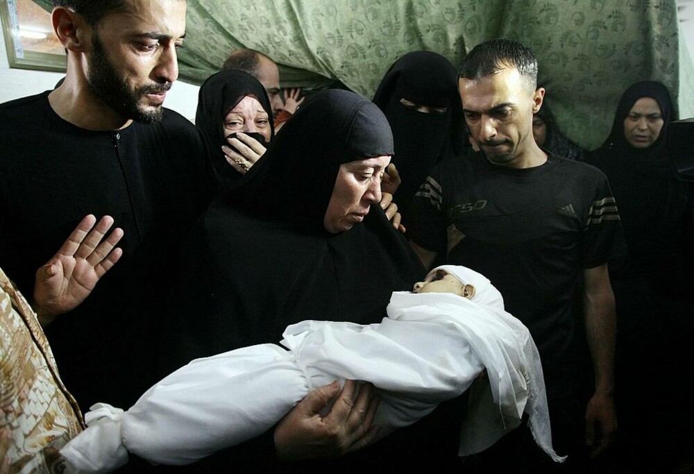Răpiți, masacrați și îngropați. Ororile inimaginabile prin care trec victimele nevinovate din Israel și Gaza | FOTO - Imaginea 3
