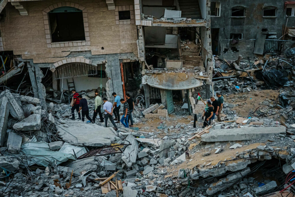 Răpiți, masacrați și îngropați. Ororile inimaginabile prin care trec victimele nevinovate din Israel și Gaza | FOTO - Imaginea 9