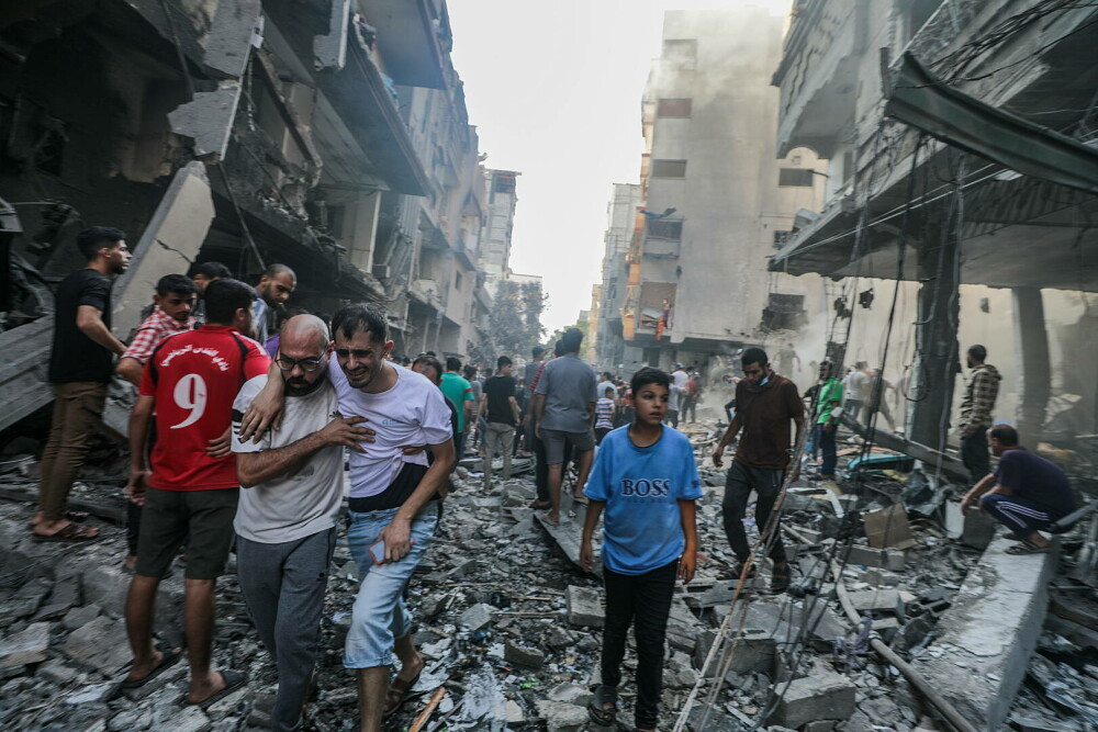 GALERIE FOTO. Cum arată Gaza după o săptămână de bombardamente ”de răzbunare” a Israelului, în urma atacului din 7 octombrie - Imaginea 4