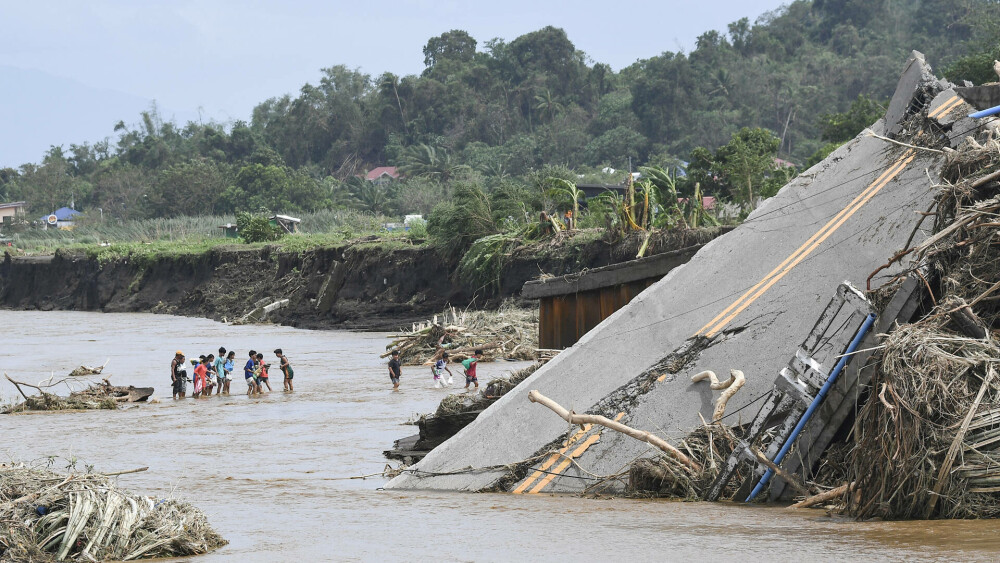 Furtuna tropicală Trami a lăsat în urma sa cel puţin 100 de morţi în Filipine. FOTO - Imaginea 5